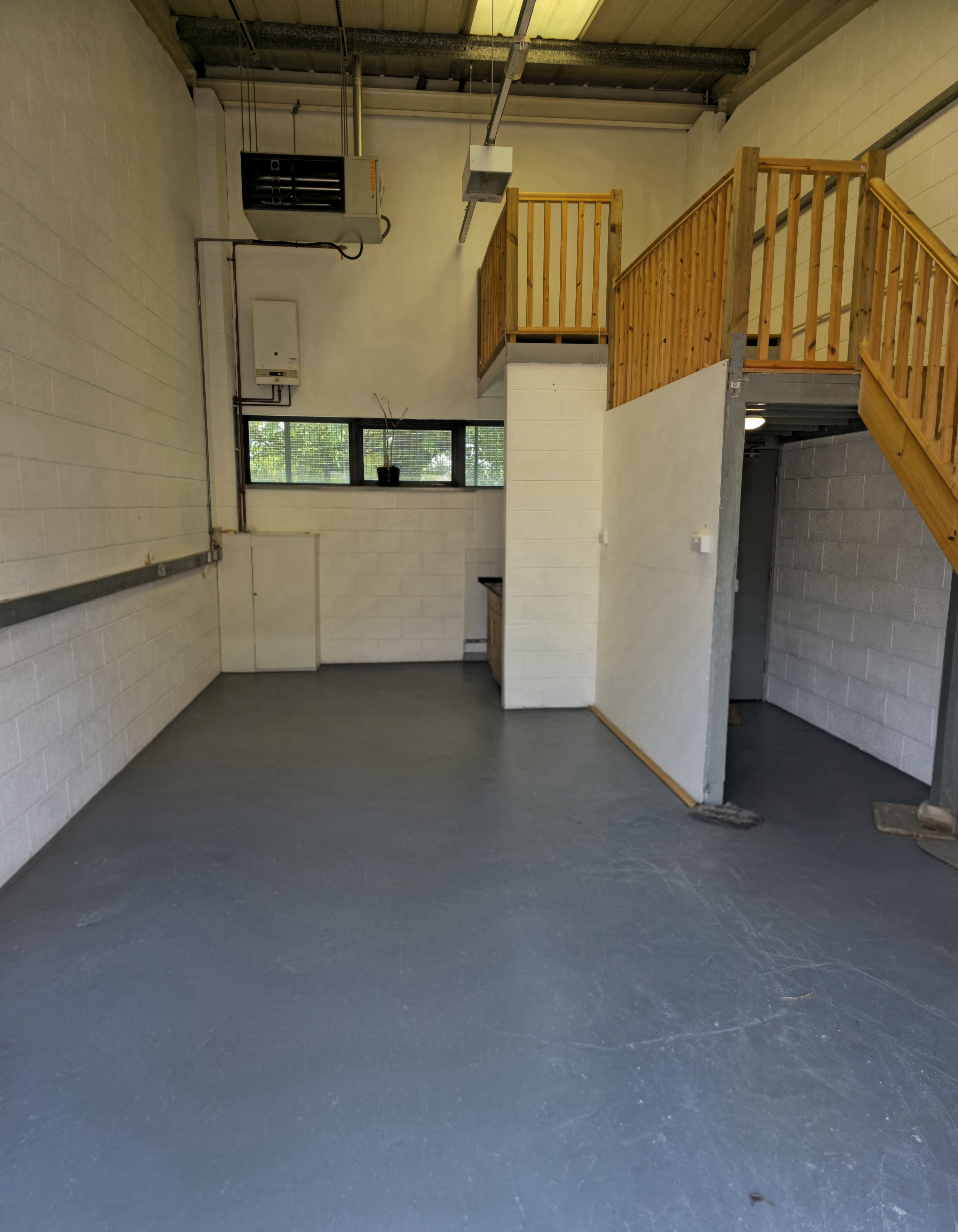 Light industrial unit interior with mezzanine level