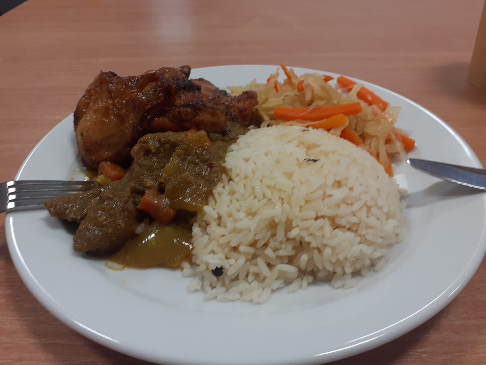 Caribbean meal with chicken and sides