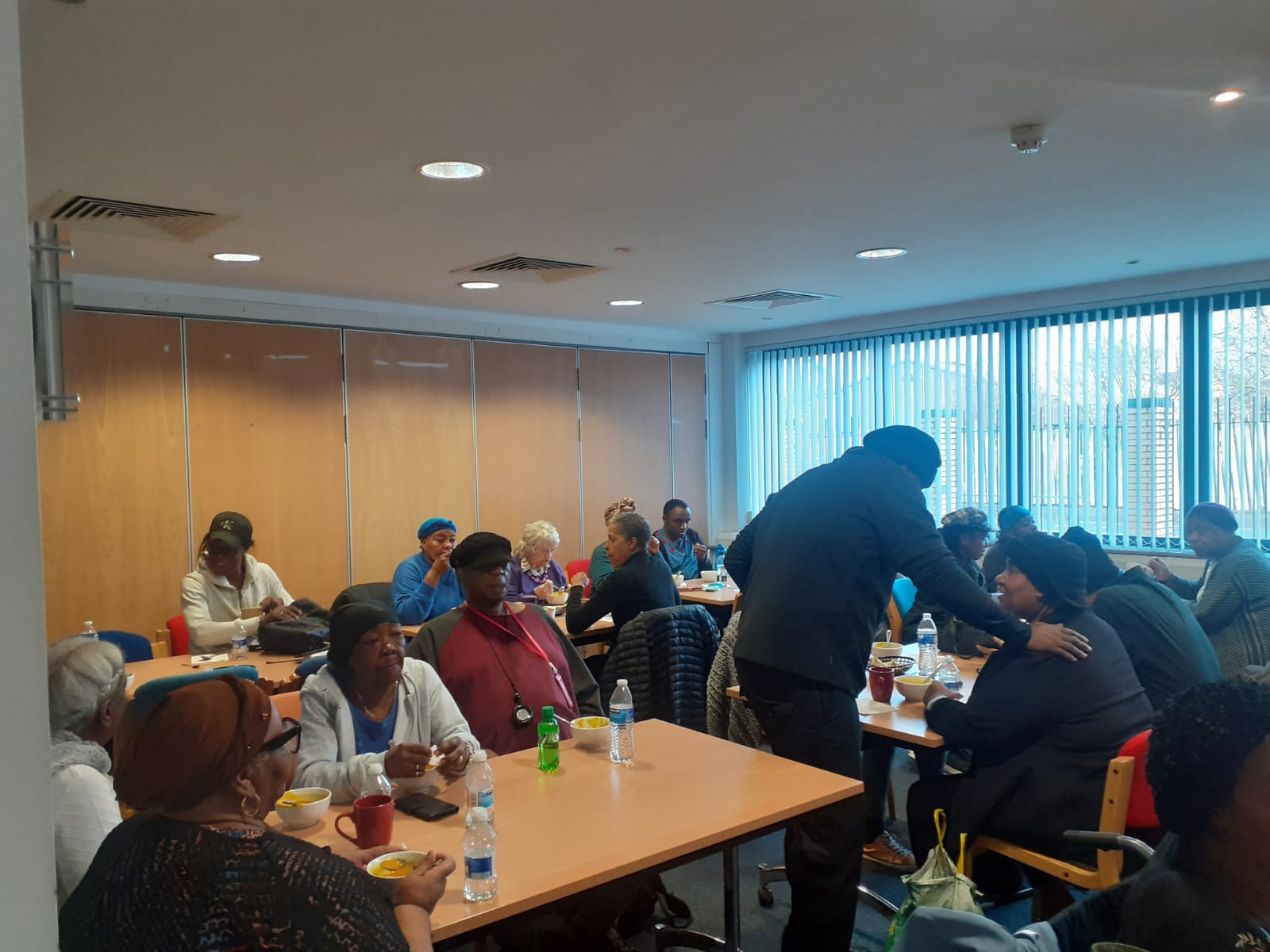 Community members enjoying meals together