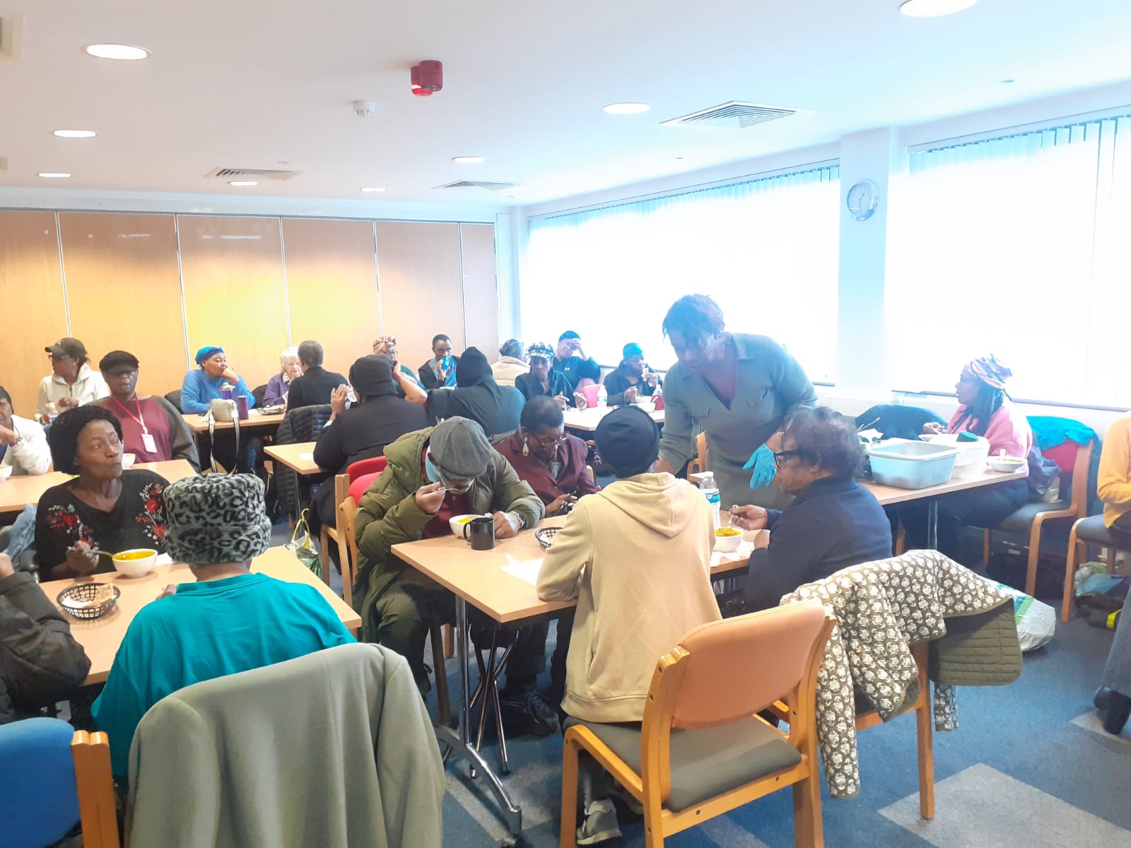 People enjoying meals in a friendly atmosphere